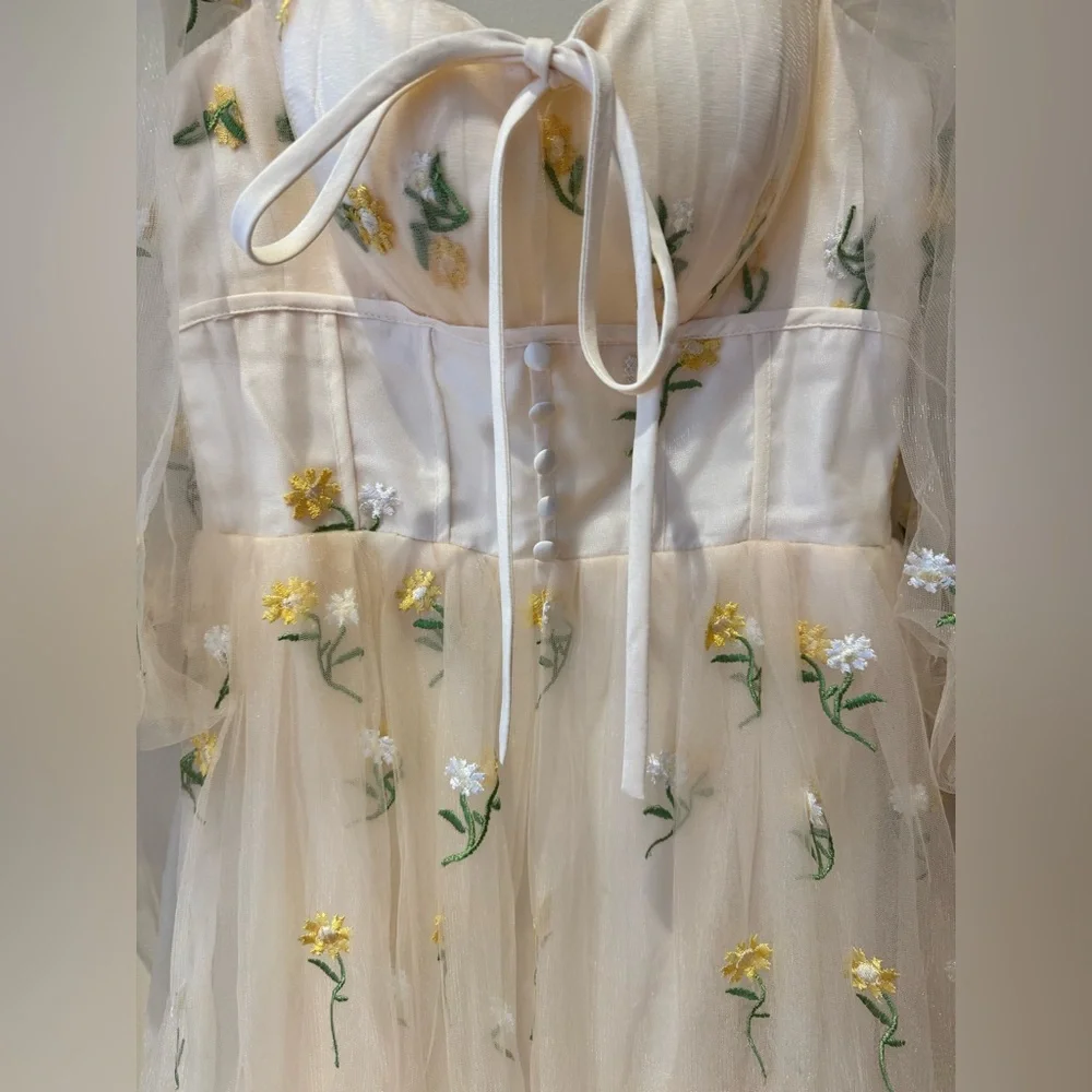 Sheer Embroidered Ivory Prom Dress with Yellow Floral Details - Picture 2 of 5